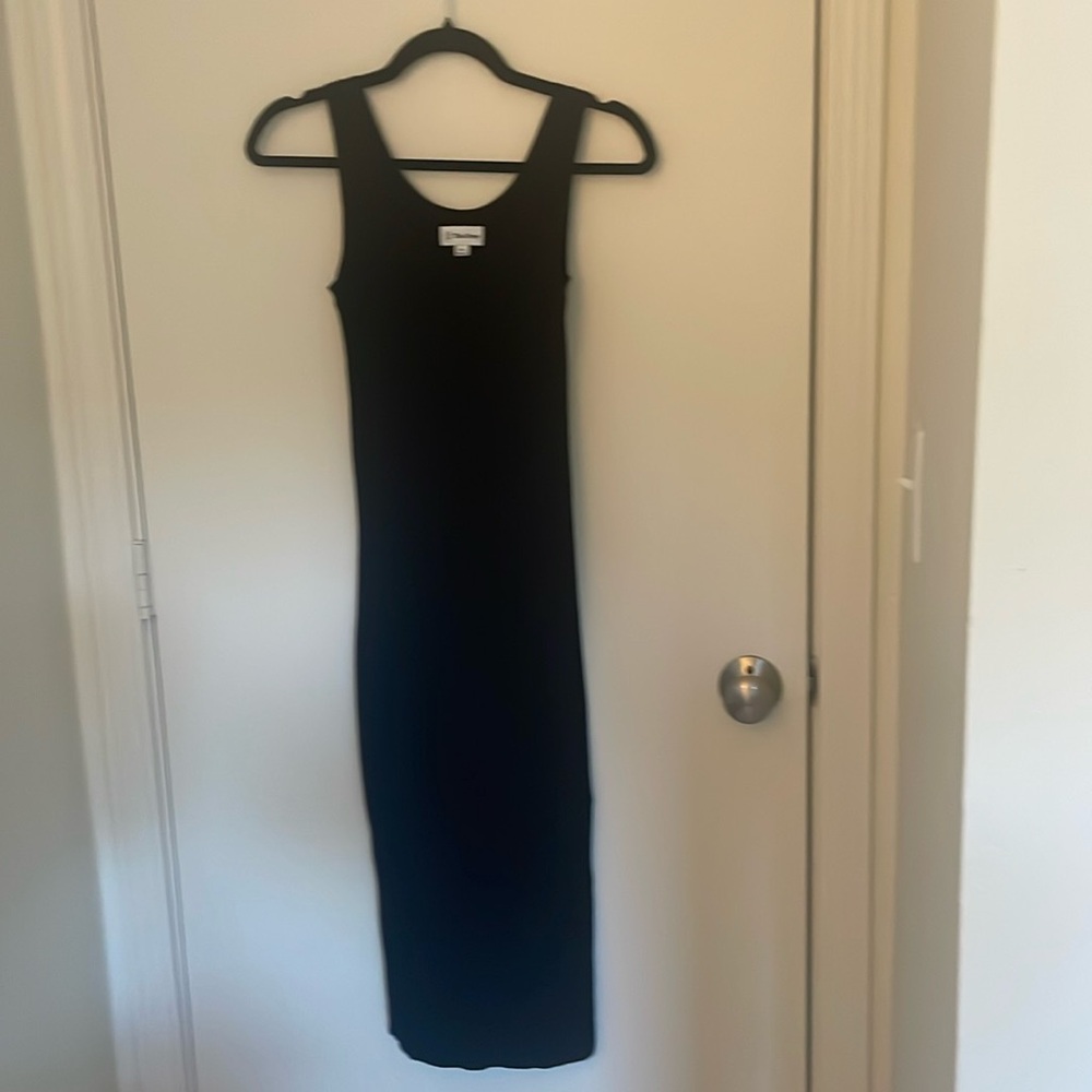 Black midi dress with slit in the bottom right